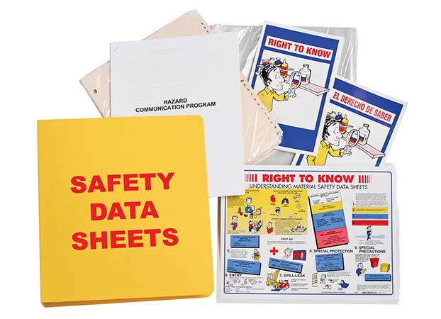 A yellow Safety Data Sheet binder with RTK, SDS and HazCom literature sticking out of it.